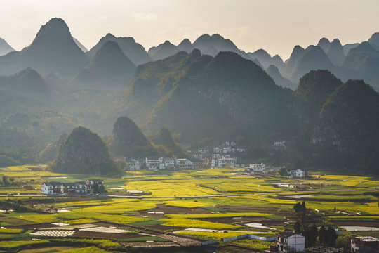 Evening light at Wanfenglin Viewpoint, Forest of Ten Thousands Peaks in Guizhou Province, China.