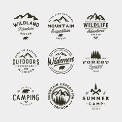 set of vintage wilderness logos. hand drawn retro styled outdoor adventure emblems. vector illustration