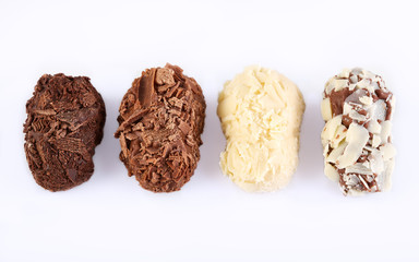 Assortment of chocolate candies sweets isolated on a white background. Chocolate candies collection.