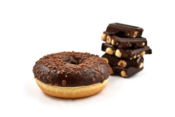 Chocolate donut and Pile of chocolate stock images. Donut on a white background. Donut with chocolate frosting