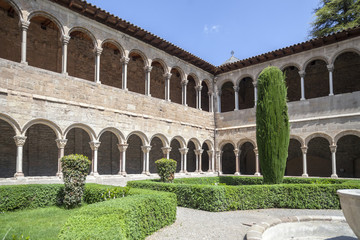 Fototapeta premium Cloister monastery benedictine romanesque style, Monestir Santa Maria de Ripoll, Ripoll, province Girona, Catalonia.Spain.