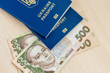 Ukrainian foreign passports and money and bitcoin coin ukraine and cryptocurrency concept