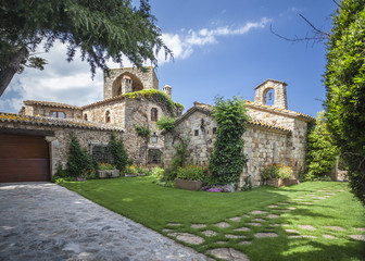 Fototapeta na wymiar Street view in the medieval and ancient village of Pals, touristic and residential location in Costa Brava, province Girona, Catalonia.Spain.