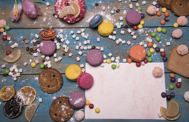 macaroons and other sweets on vintage table