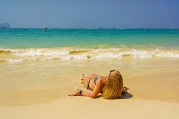 woman resting at the  tropical Thailand Railay beach