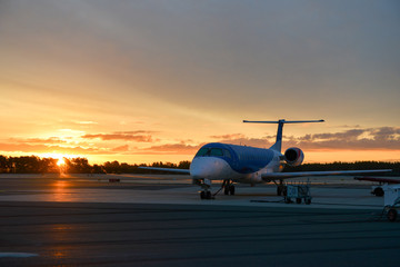 Fototapeta na wymiar Embraer ERJ 145 in sunrise