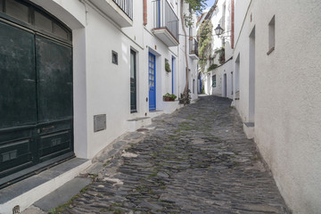 Narrow street in town of Cadaques,Costa Brava, province Girona, Catalonia.Spain.