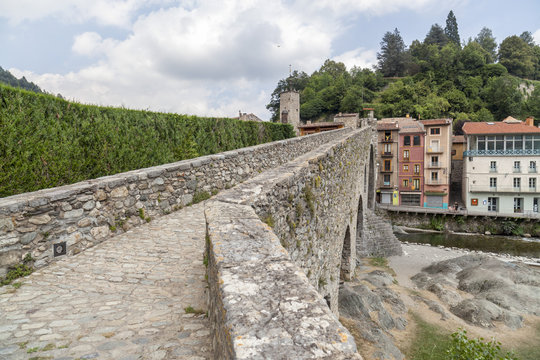 Village view, bridge, gothic style,Pont Nou and pyrenees mountain in village of Camprodon, ripolles comarca region, province girona, Catalonia.Spain.