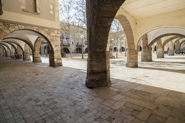 Fototapeta na wymiar Archs in main square of Banyoles,Catalonia,Spain.
