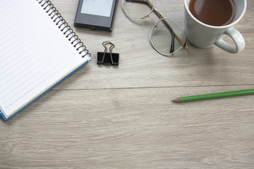Work desk, laminate flooring that has placed many devices seen from top view.