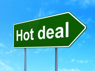 Finance concept: Hot Deal on green road highway sign, clear blue sky background, 3D rendering