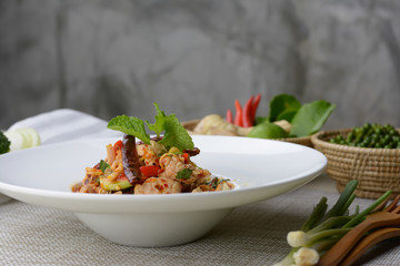 Pork with herbs and egg plant spicy salad (Pla Moo )