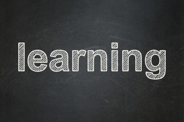 Obraz premium Studying concept: text Learning on Black chalkboard background