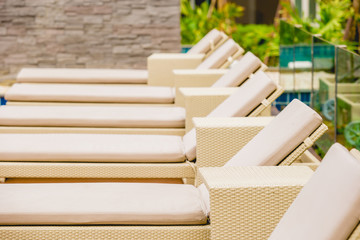 Relaxing Rattan Sofa At Swimming Pool,Vintage filter