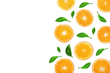 Slices of orange or tangerine with leaves isolated on white background with copy space for your text. Flat lay, top view