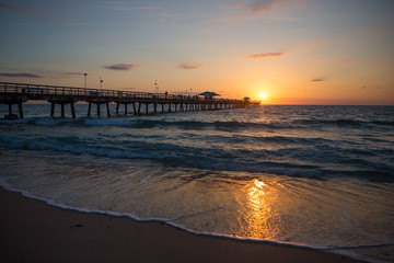 Fototapeta na wymiar Peaceful early morning beach sunrise in Ft. Lauderdale, FL