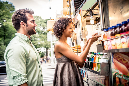 Couple at kiosk in New York