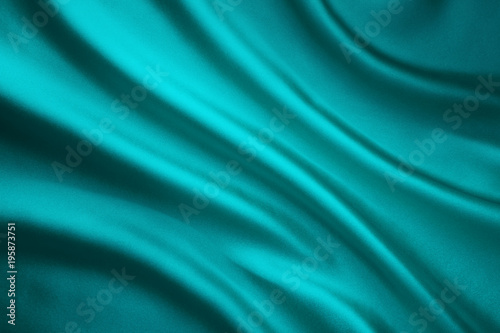 “Fabric Waving Silk Background, Teal Satin Cloth Crumpled in Wave Shape