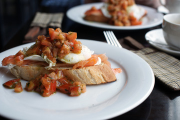 Sandwich with tomatoes, fish and eggs