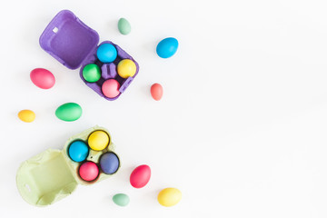 Easter eggs on white background. Easter concept. Flat lay, top view, copy space