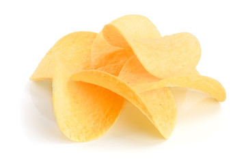 heap of potato chips on white background close-up