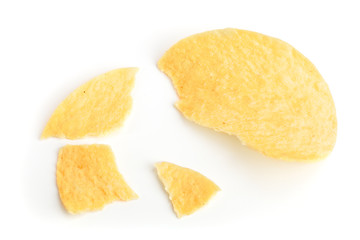 Potato chips crumbs and leftovers isolated over the white background