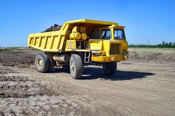 Dump truck on the construction site