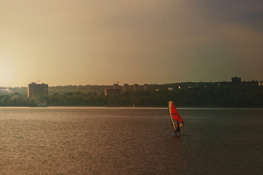 Lonely sportsman under sail.