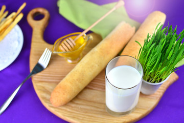 Natural and eco milk in a glass at the farm kitchen. Healthy food concept.