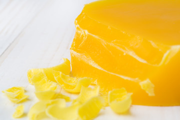 Pieces of beeswax for making candles. Beekeeping products. Apitherapy.