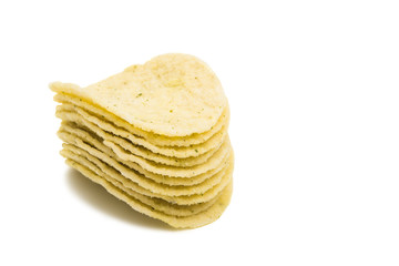 Salted potato chips isolated