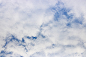 White clouds against blue sky. Sky background
