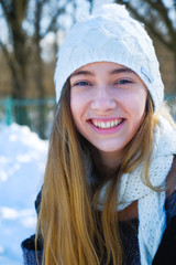 winter portrait of a young beautiful girl