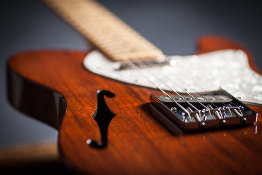 Close up detail of effe of vintage electric guitar. Musical instrument. Black background