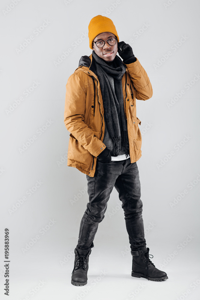 Sticker African-American man posing on gray background