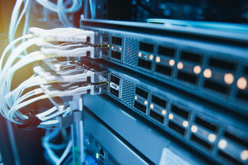 Fiber optic cables connected on core network switch . Data center concept