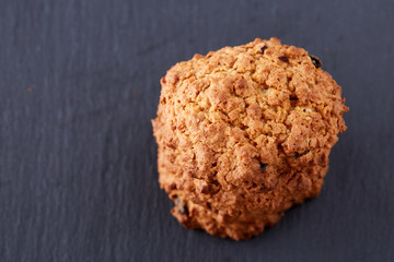 Sweet biscuits arranged in pattern on light textured background, close-up, shallow depth of field, selective focus.