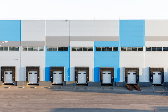 modern logistics center, ramp with gates for loading trucks