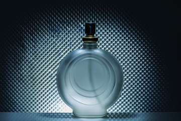  bottle of cologne perfume on a gray light background