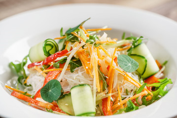 spring salad on the wooden background