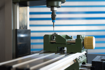 CNC milling machine processing plastic detail.Cutting plastic  modern processing