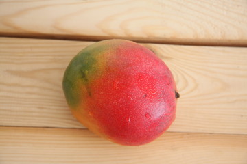 Mango on wooden table