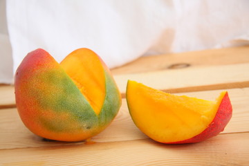 Mango on wooden table