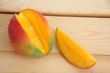 Mango on wooden table