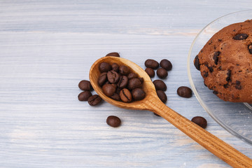 Sweet cookies with chokolate on pastel blue background