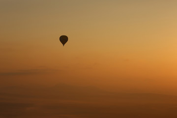 Hot air balloons, atmosphere ballons flying over mountain landscape at Mallorca in the sunrise