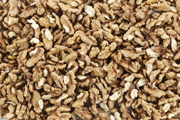 peeled walnuts as background