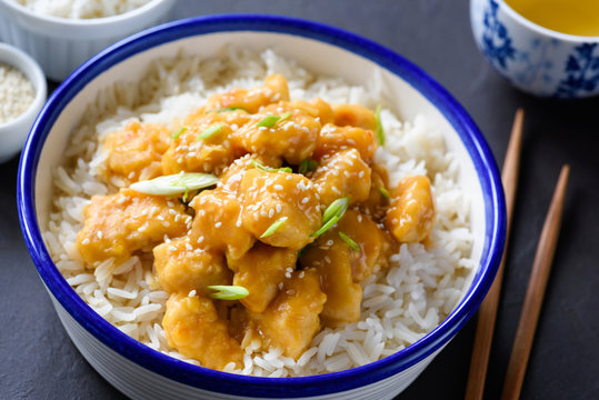 Chicken with rice in a bowl, chinese cuisine, closeup view