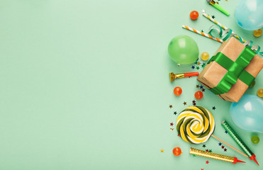 Birthday party background with gift and lollipops