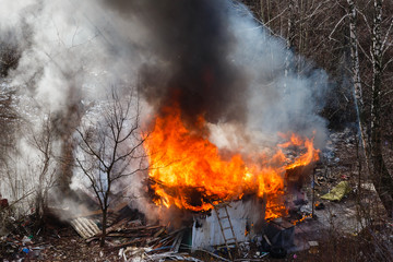 Burned wooden residential house with burnt walls city and its problems catastrophe accident